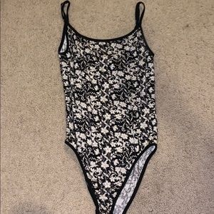 Black and white floral body suit